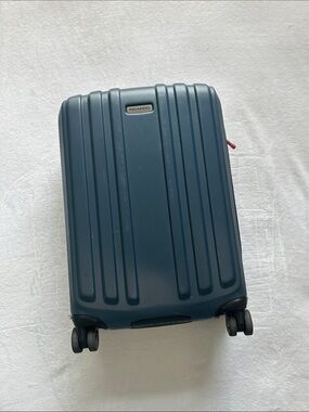 Ricardo Navy Blue Carry-On Spinner Luggage